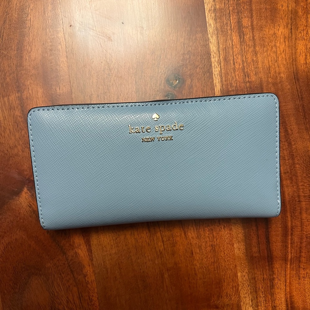 Kate Spade Slim Bifold Wallet with snap closure